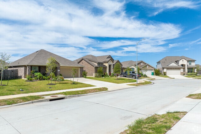A row of newly built homes sits alongside a quiet cul-de-sac in La Marque.