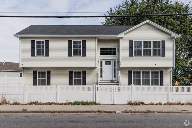 This is a good example of a newer split level house in Wanskuck, RI.