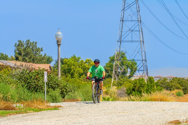Enjoy an exhilarating bike ride through the scenic landscapes of The Preserve, Chino.