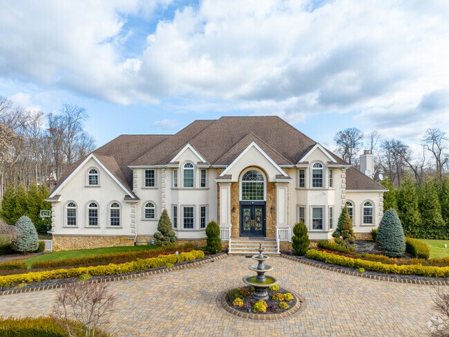 Large homes with traditional architecture can be found in East Freehold.
