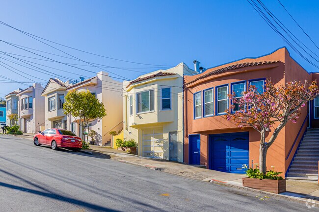 Morning sunshine basks the common Mediterranean home in Excelsior.