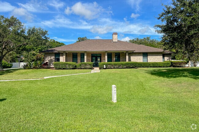 Well-manicured lawns are a frequent sight in the White City neighborhood.