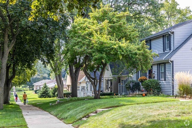 Walk along the sidewalks in Columbus Park and enjoy the beautiful yards.