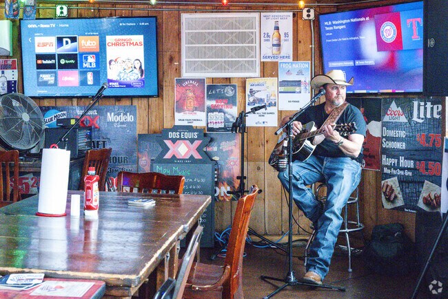 At the Texas Pit BBQ Saginaw's soundtrack sets the rhythm for local nightlife.