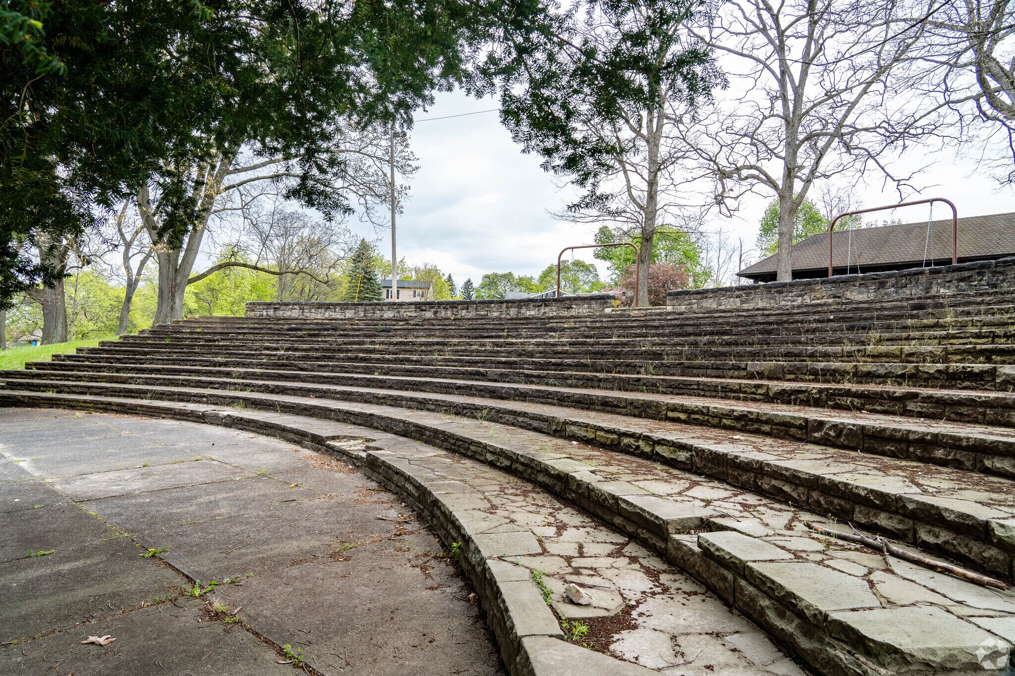 Relax on the steps of the amphitheater in Chestnut Park.