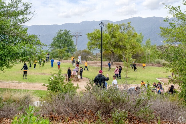 Families laugh and play together at Deukmejian Wilderness Park.