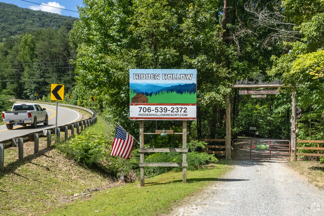 High Point's Hidden Hollow Resort, nestled under trees, offers camping & outdoor fun.