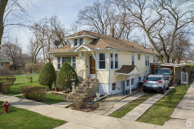 An elegant and charming home located in the Phoenix, IL area.