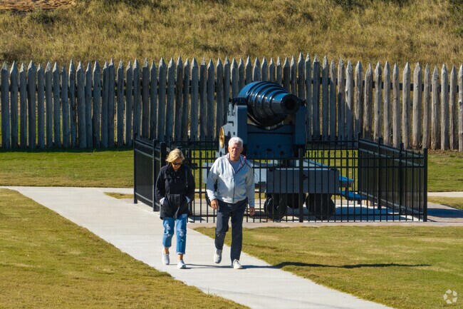 Fort Fisher trails wind through maritime forests, salt marshes, and dunes of Kure Beach.
