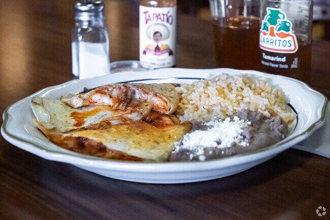 A mouthwatering shrimp quesadilla plate complete with tamarind soda at La Palapa Restaurant