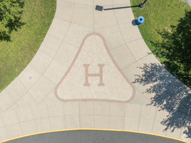 Highland Elementary School has a big H imprinted out front.