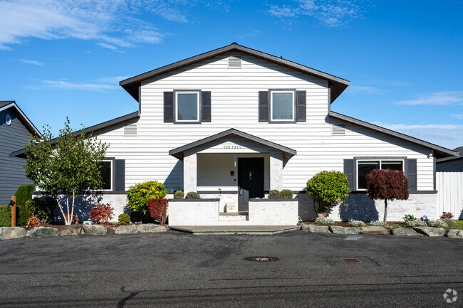 Traditional-style homes often sit on waterfront lots with spacious yards in Mukilteo.