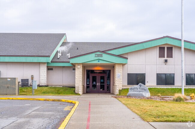Betty Kiefer Elementary School has a dedicated parking lot for visitors and staff.