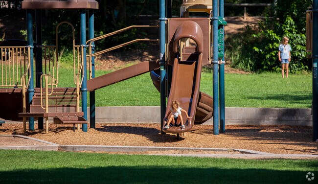 Families enjoy a play day at Templeton Park in Templeton, California.