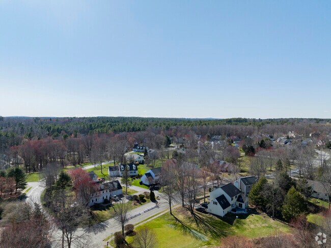 Neighborhoods off North Broadway feature New England homes in scenic settings.