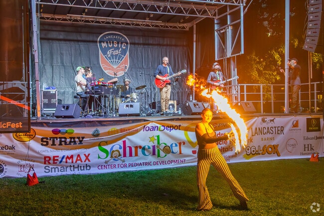 A fire dancer performs for the crowd at the Lancsaster MusicFest.