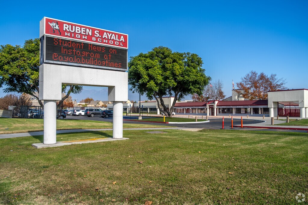 The signage of Ruben S. Ayala High School offers essential information and a warm welcome.