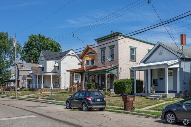 A row of homes in Elmwood Place shows off the variety of architecture in the neighborhood.