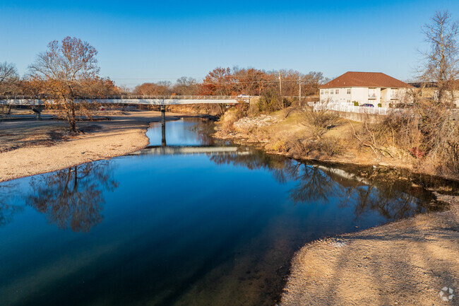 Shoal Creek adds to the beauty of the Arbor Hills neighborhood.