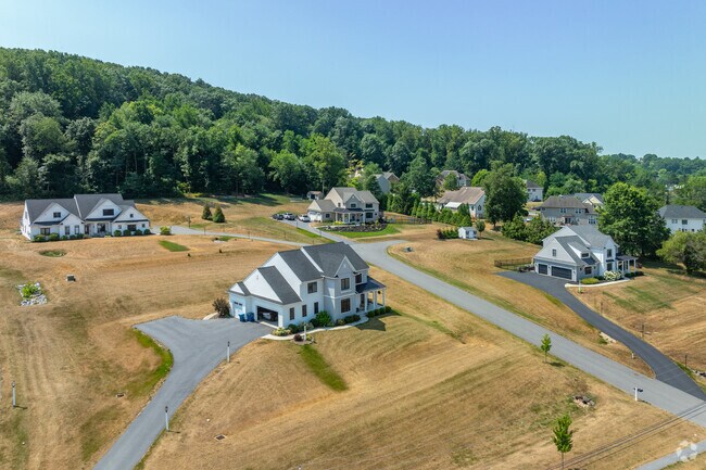 Some newly built homes in Farmdale sit on oversize lots of land and offer scenic views.