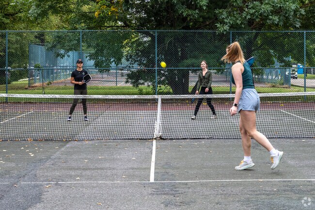 Get active and have fun playing pickleball with friends.