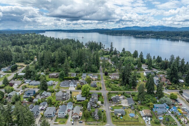 Hanna Place features dense woodlands that contrast with downtown's bustling streets.