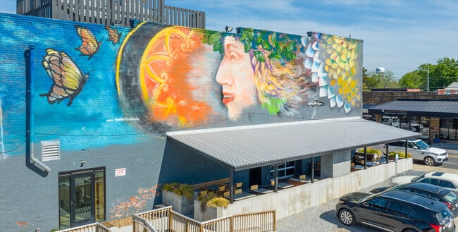 Clark Hippolito's abstract mural on  Crawford Cookshop is meant to inspire imagination.