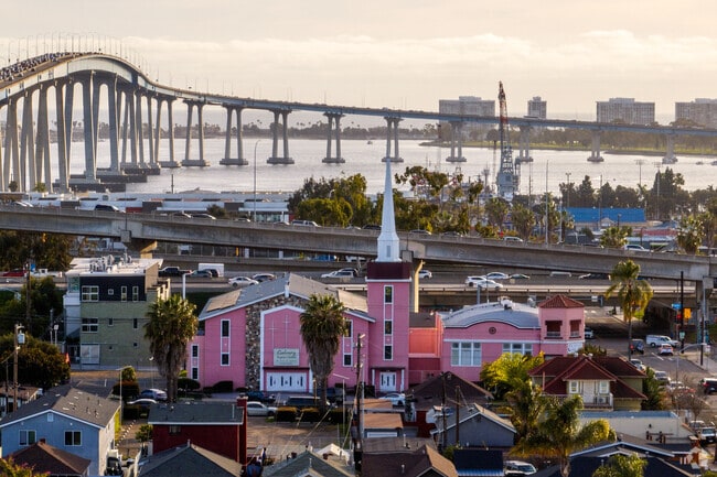 Logan Heights with the Calvary Baptist Church and the Coronado Bridge in the background.