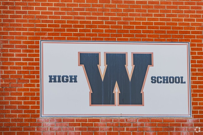 Close up shot of a the symbol of Wayne High School.