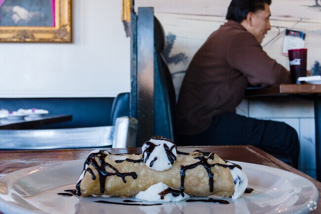 Cannelloni is a traditional Italian pastry available at Romas Italian Bistro in Duncanville.