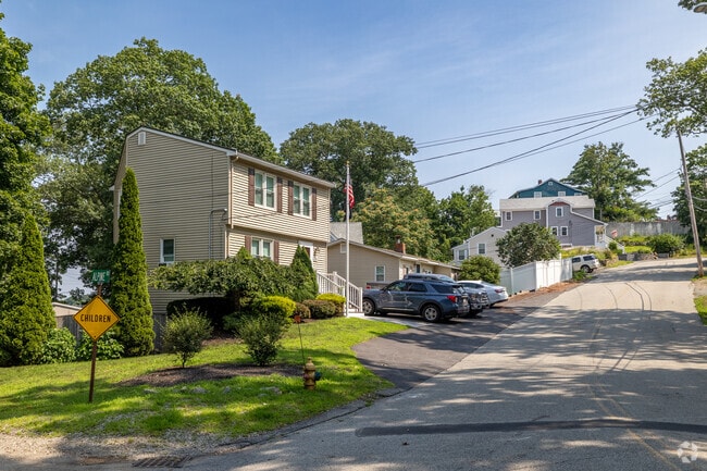 Homes around Whitman pond rest on winding and hilly roads in East Weymouth.