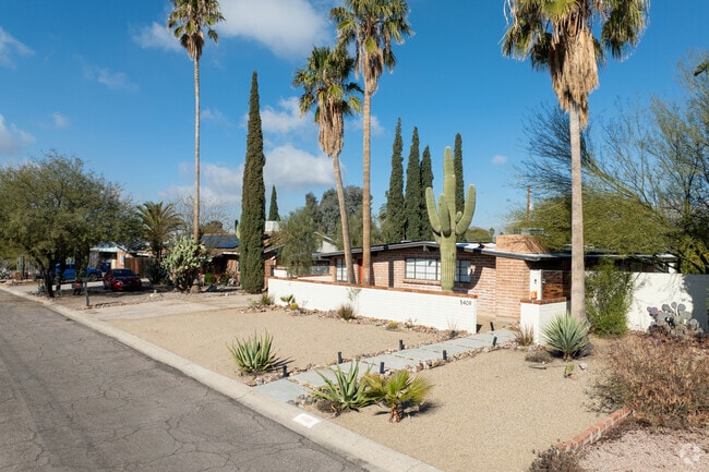 Desert landscaping and accent walls are seen in Highland Vista Cinco Via.