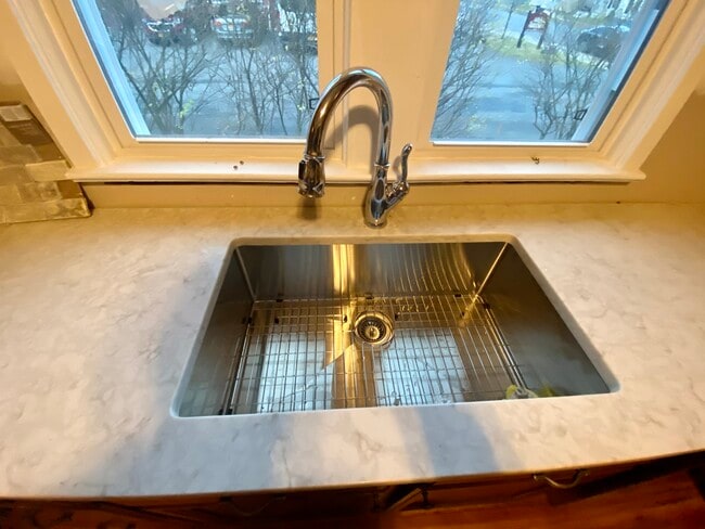 Oversized, stainless steel sink