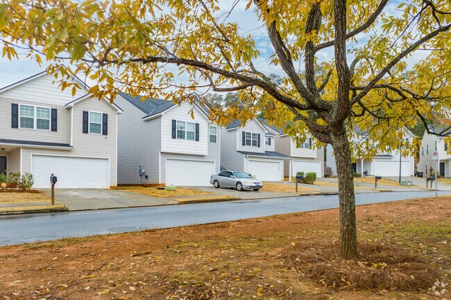 Single-family homes in Cartersville feature attached car garages.