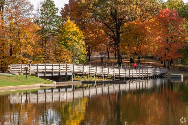 Residents enjoy walking the trails at Munroe Falls Metro Park,.