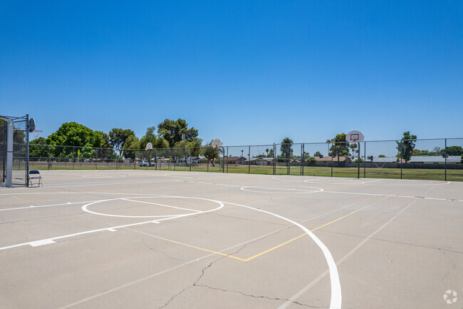 Play basketball on the court at Tumbleweed Elementary School in Phoenix.