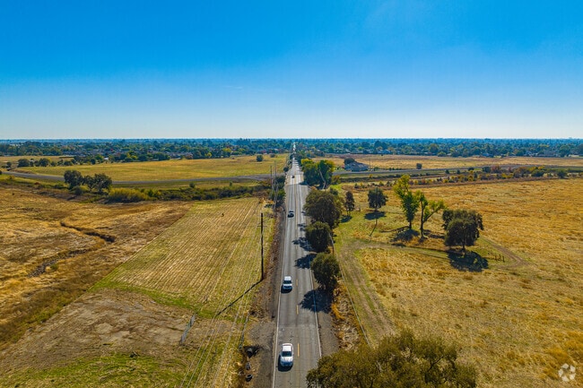 North side of Robla features fields, Dry Creek and even livestalk.