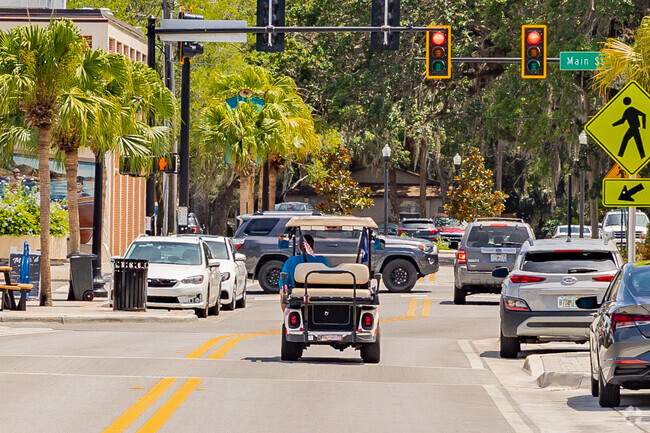 A common sight in New Port Richey South is a golf cart sitting at a traffic light.