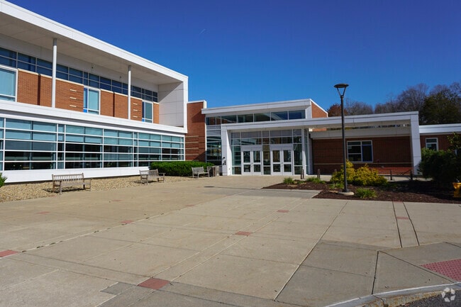 Parents can sit outside to wait for their kids afterschool at the Center School in Stow, MA.
