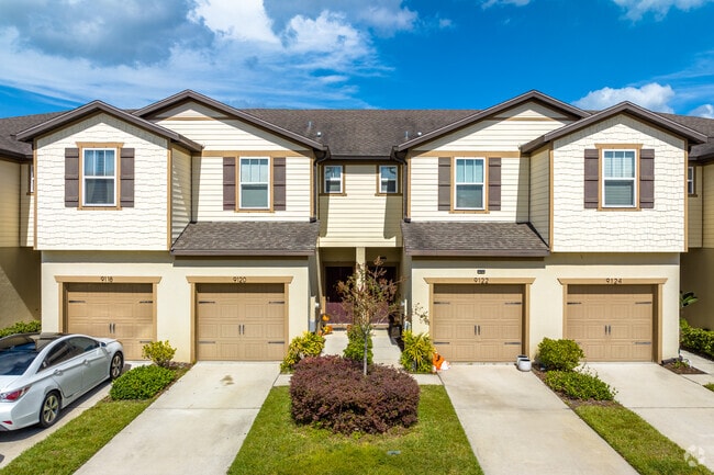 Progress Village is home to townhomes with attached garages, community pools, & clubhouses.