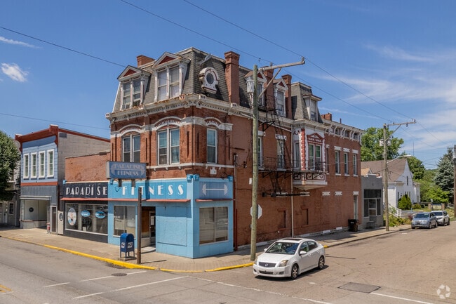 Elmwood Place’s Vine Street includes historic Second Empire architecture.