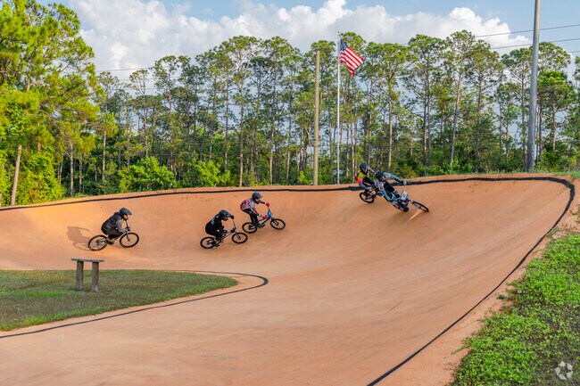 Set your sights on the finish line while BMX racing at Strickland Park in Tuscany Woods.