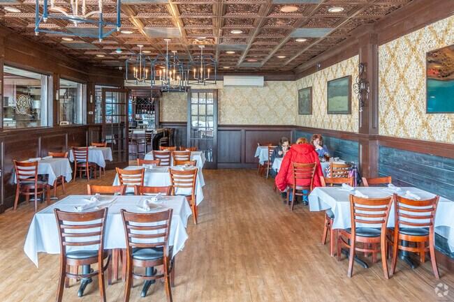 Enjoy a meal in the dining room of Mary's Pizza and Pasta in nearby North Great River.