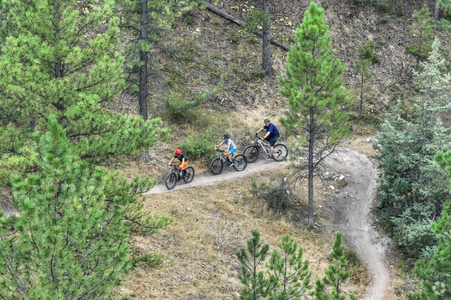 Bikers enjoy the rugged trails of Mount Ascension, a perfect outdoor getaway.