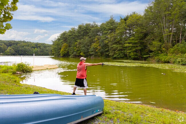 A fisherman casts a line at Sweet Arrow Lake County Park.