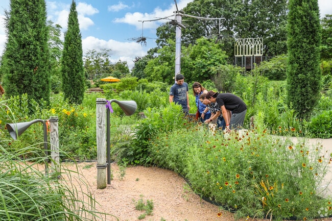 Walk the beautiful, perfectly manicured paths of the Tulsa Botanic Garden near Acre Gardens.