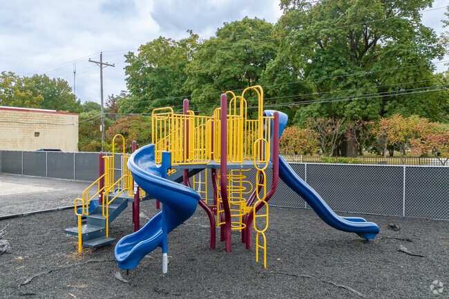 Central Point Preparatory Academy in Outer Greater Hilltop features a playground for children.