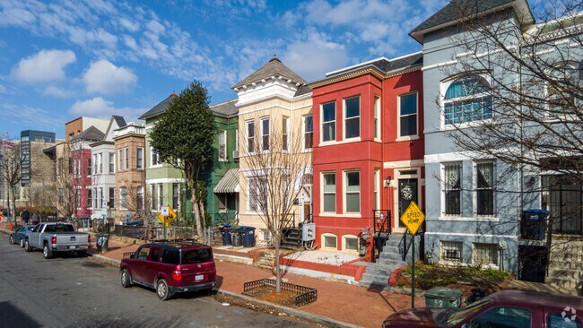 Lines of colorful row homes are common throughout DC but Truxton Circle has them in spades.