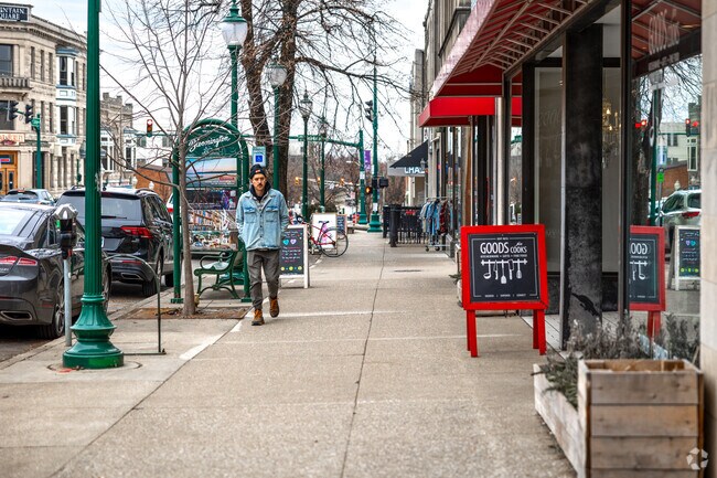 The streets of downtown Bloomington near Near West Side are lined with trees.