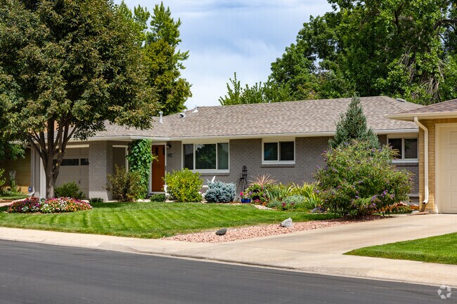 Brick ranch homes often sit on manicured yards in Loomiller.